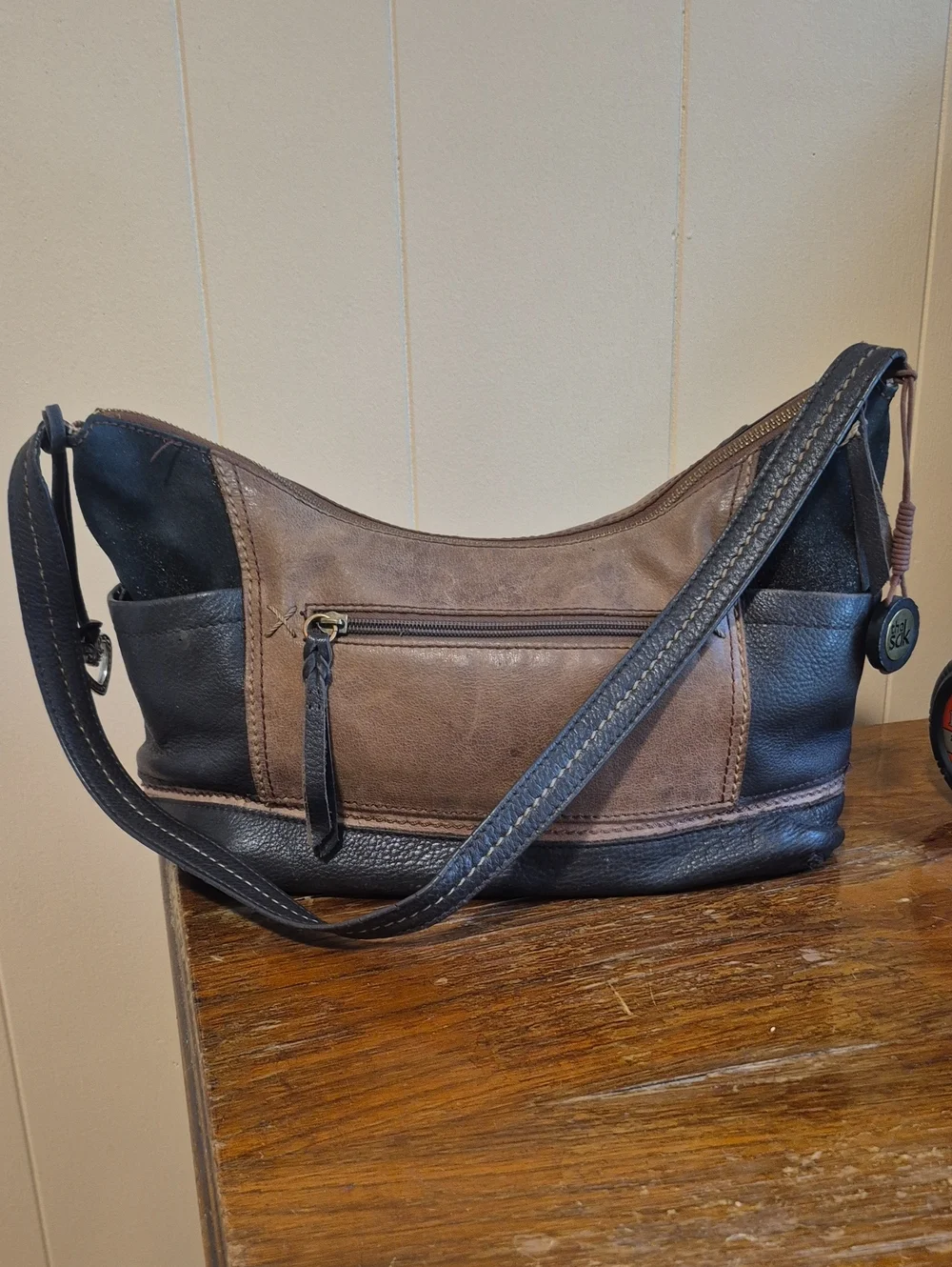 The Sak Two-Tone Brown and Black Leather Messenger Bag